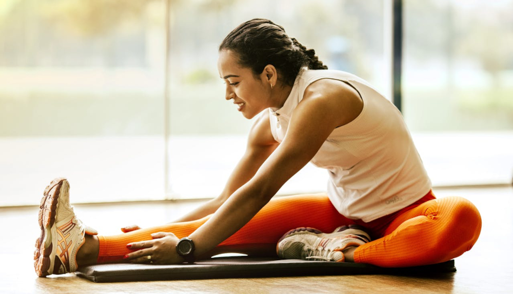 woman stretching before workout